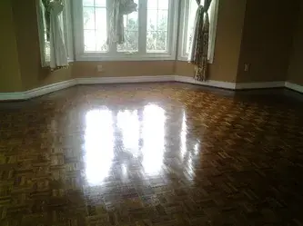 Polished parquet wood floor with intricate pattern